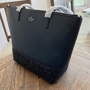 Brand new Kate Spade purse. Tags still on!